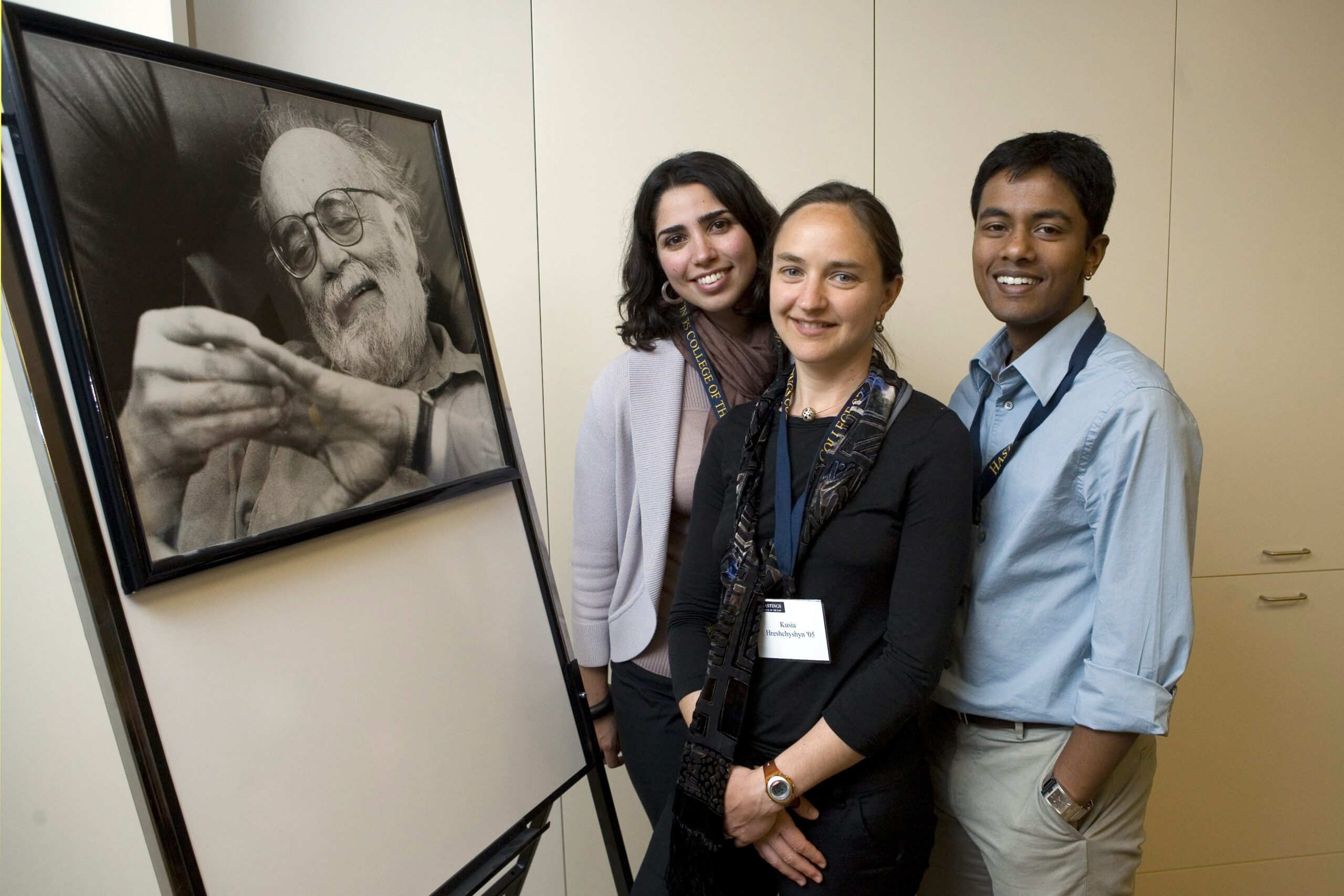 Abascal fellows pose next to a picture of Abascal